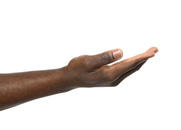 African-American man holding something in hand on white background, closeup