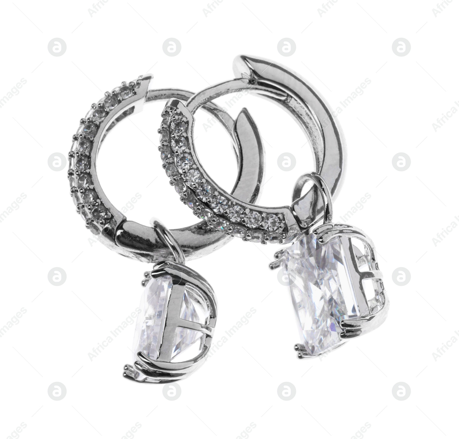 Photo of Luxury earrings on white background. Elegant jewelry