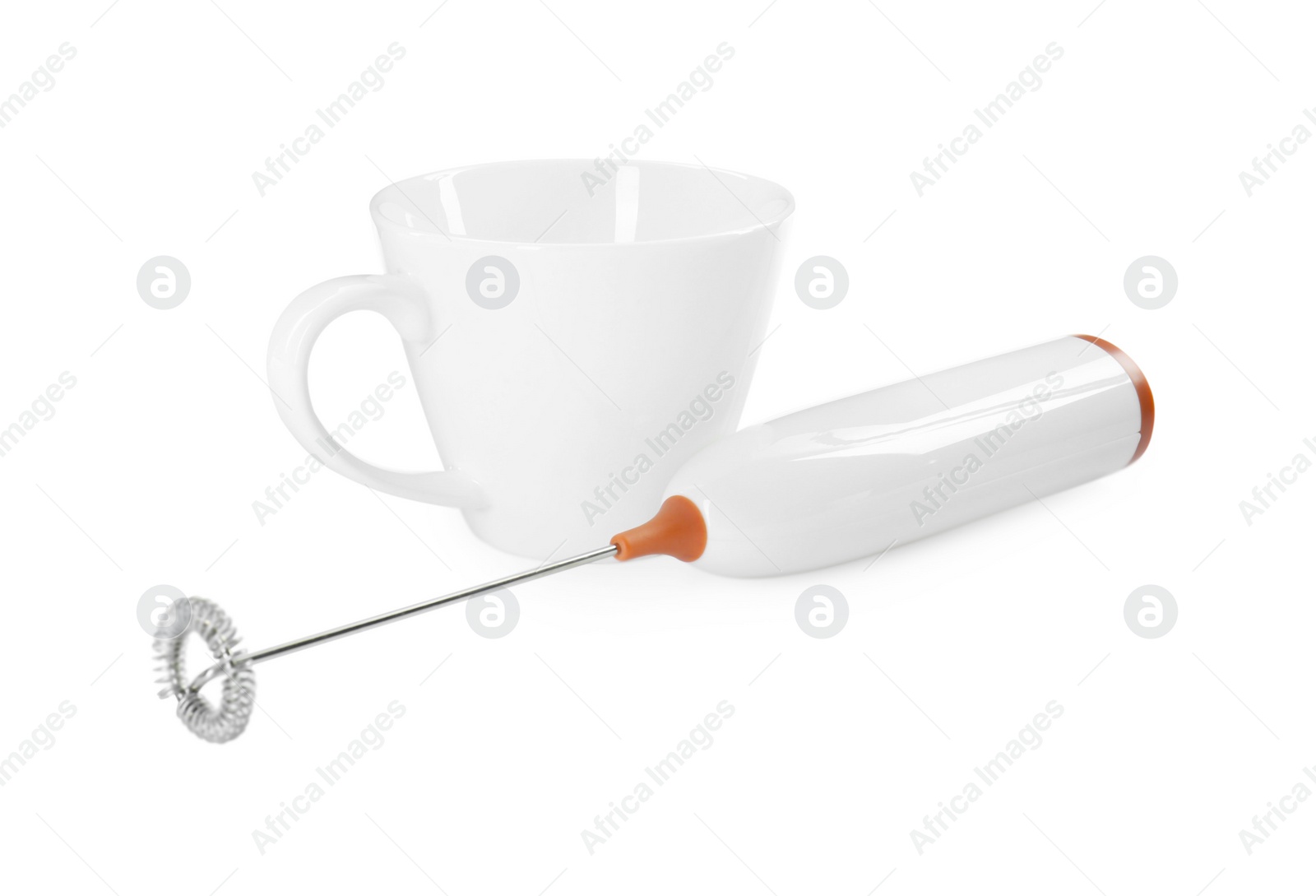 Photo of Milk frother wand and cup isolated on white