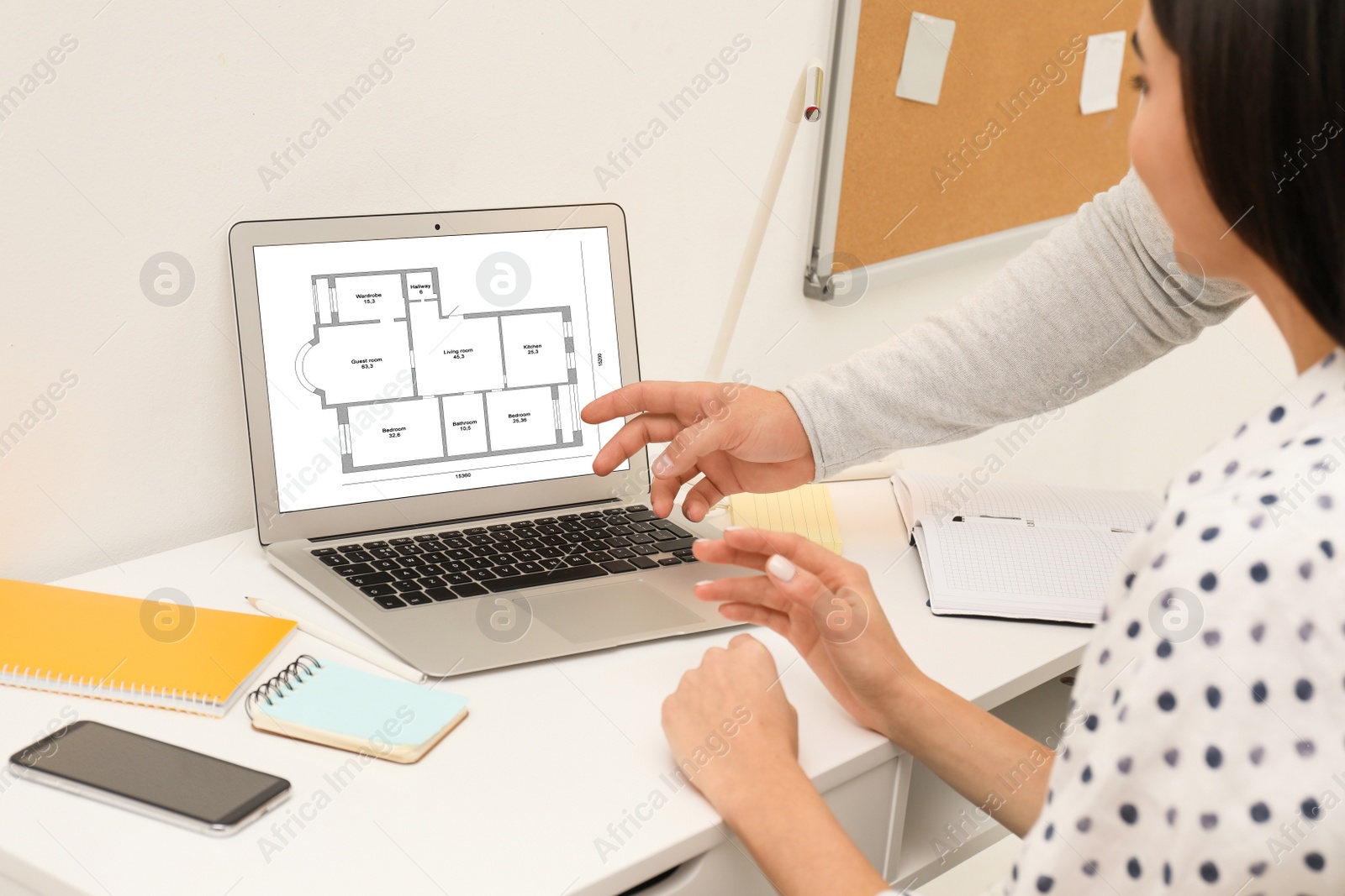 Image of Architects making project of house on laptop in office, closeup