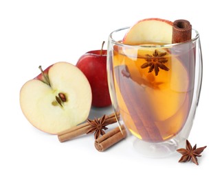 Hot mulled cider and ingredients on white background