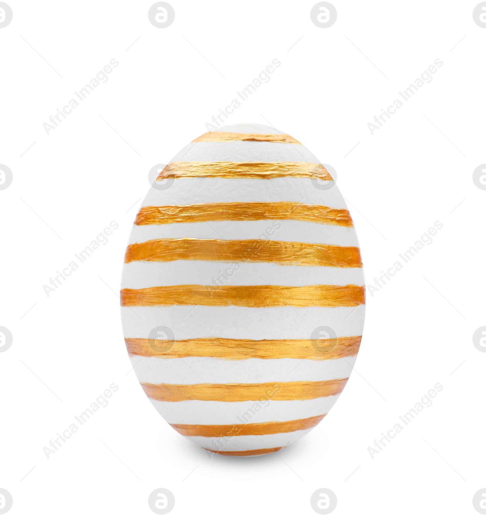 Photo of Traditional Easter egg decorated with golden paint on white background