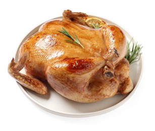 Photo of Tasty roasted chicken with rosemary and lemon isolated on white