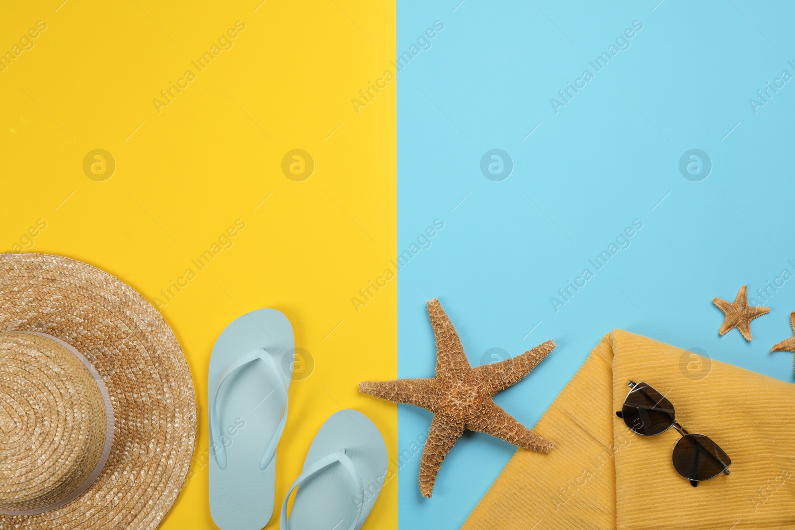 Photo of Flat lay composition with beach objects on color background, space for text