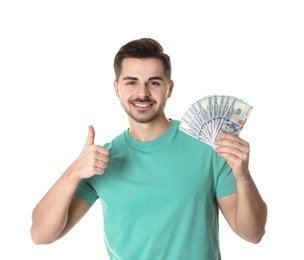 Portrait of happy young man with money on white background