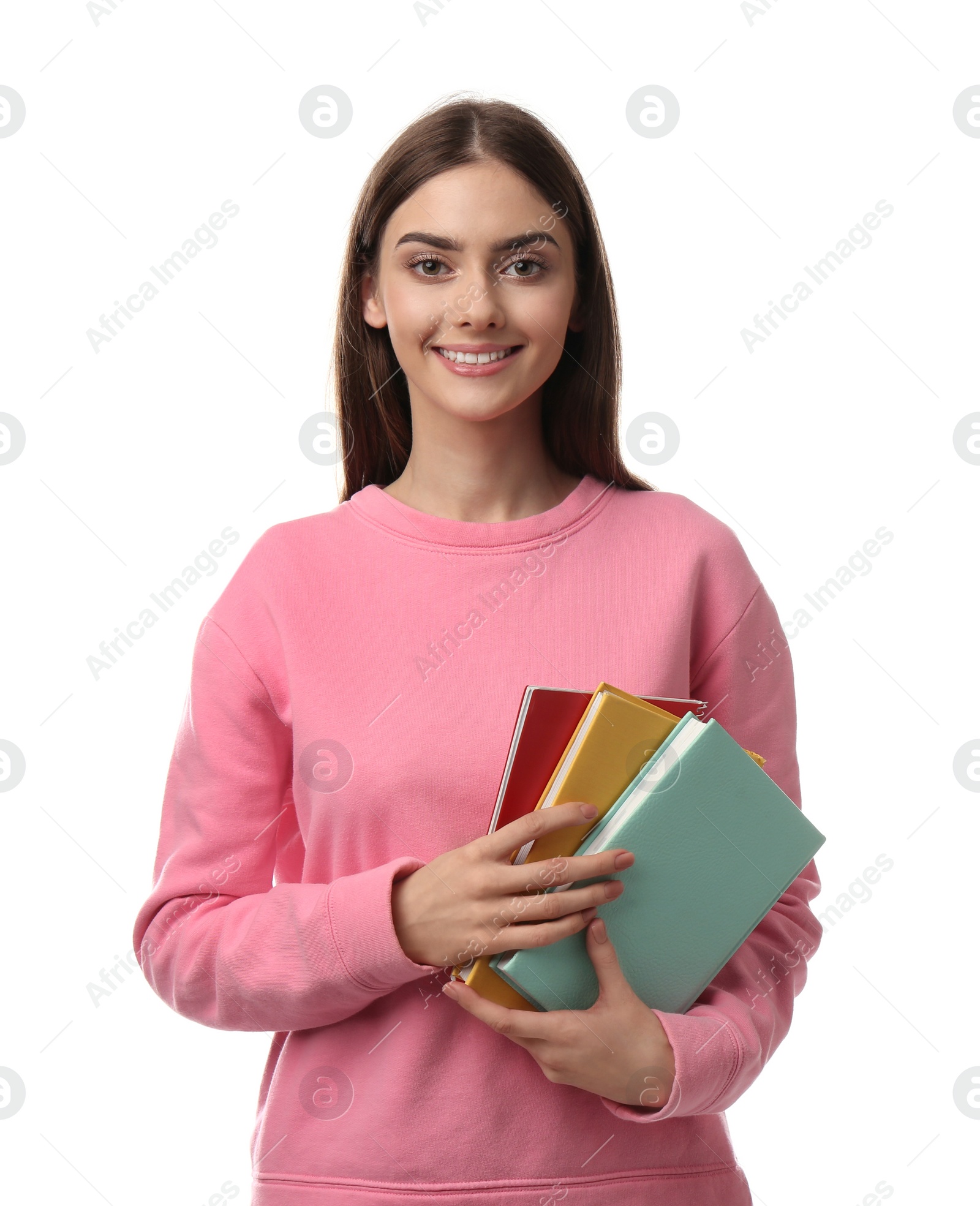 Photo of Teenage student holding books on white background