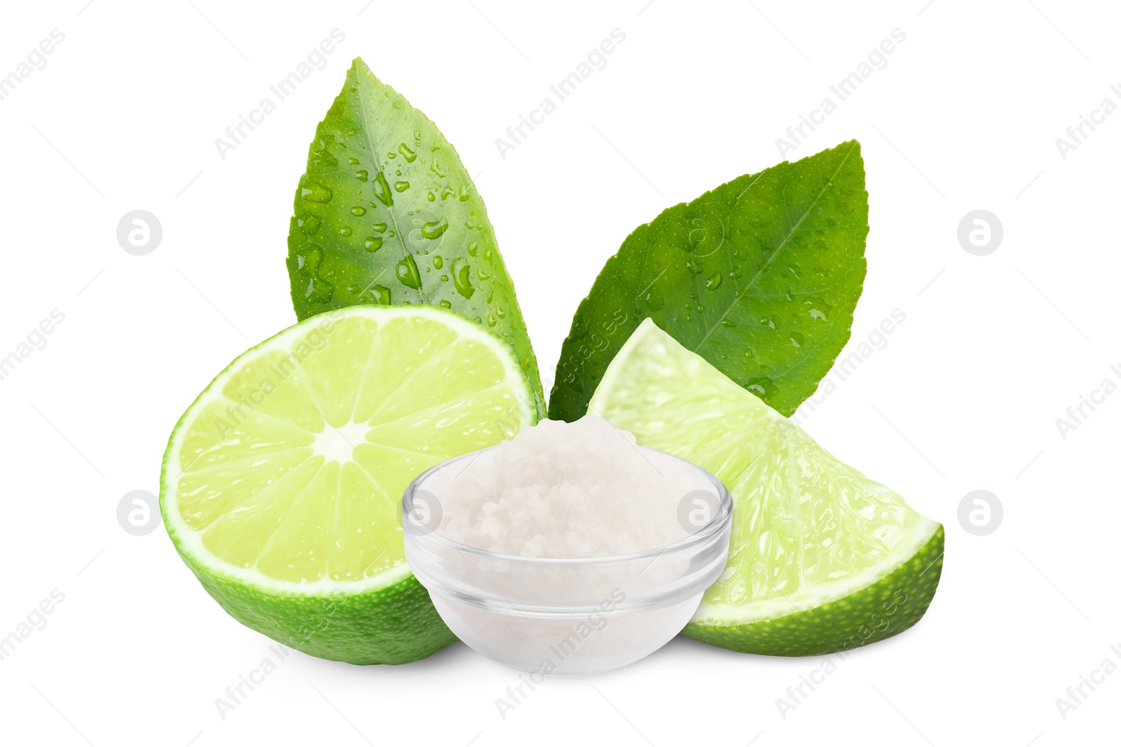 Image of Cut lime and salt isolated on white. Margarita cocktail ingredients