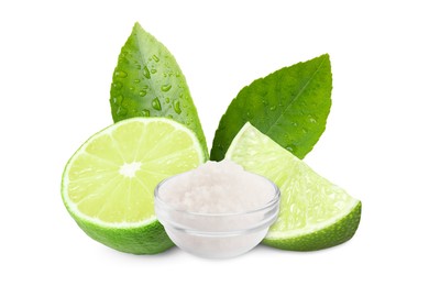 Image of Cut lime and salt isolated on white. Margarita cocktail ingredients