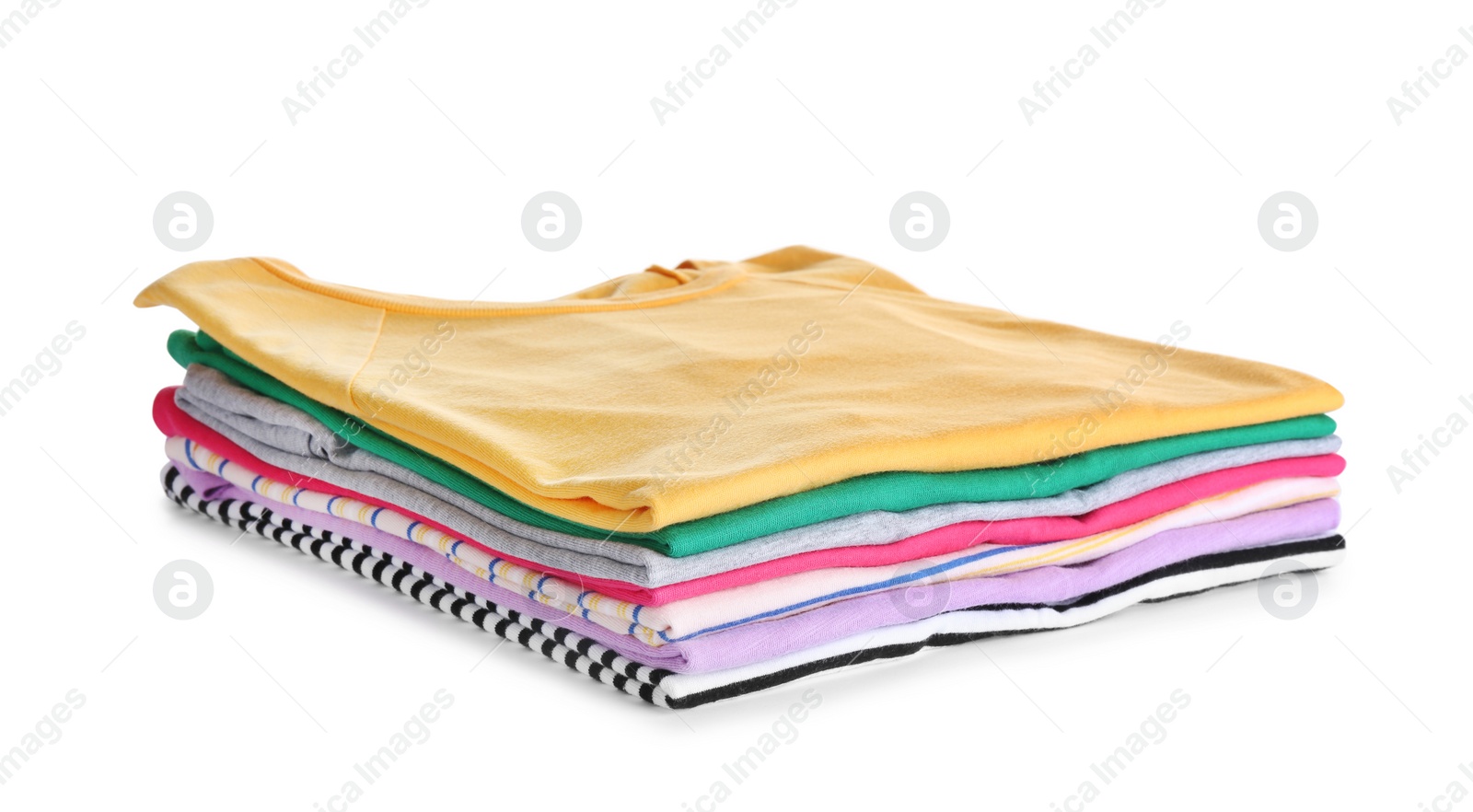 Photo of Pile of ironed clothes isolated on white