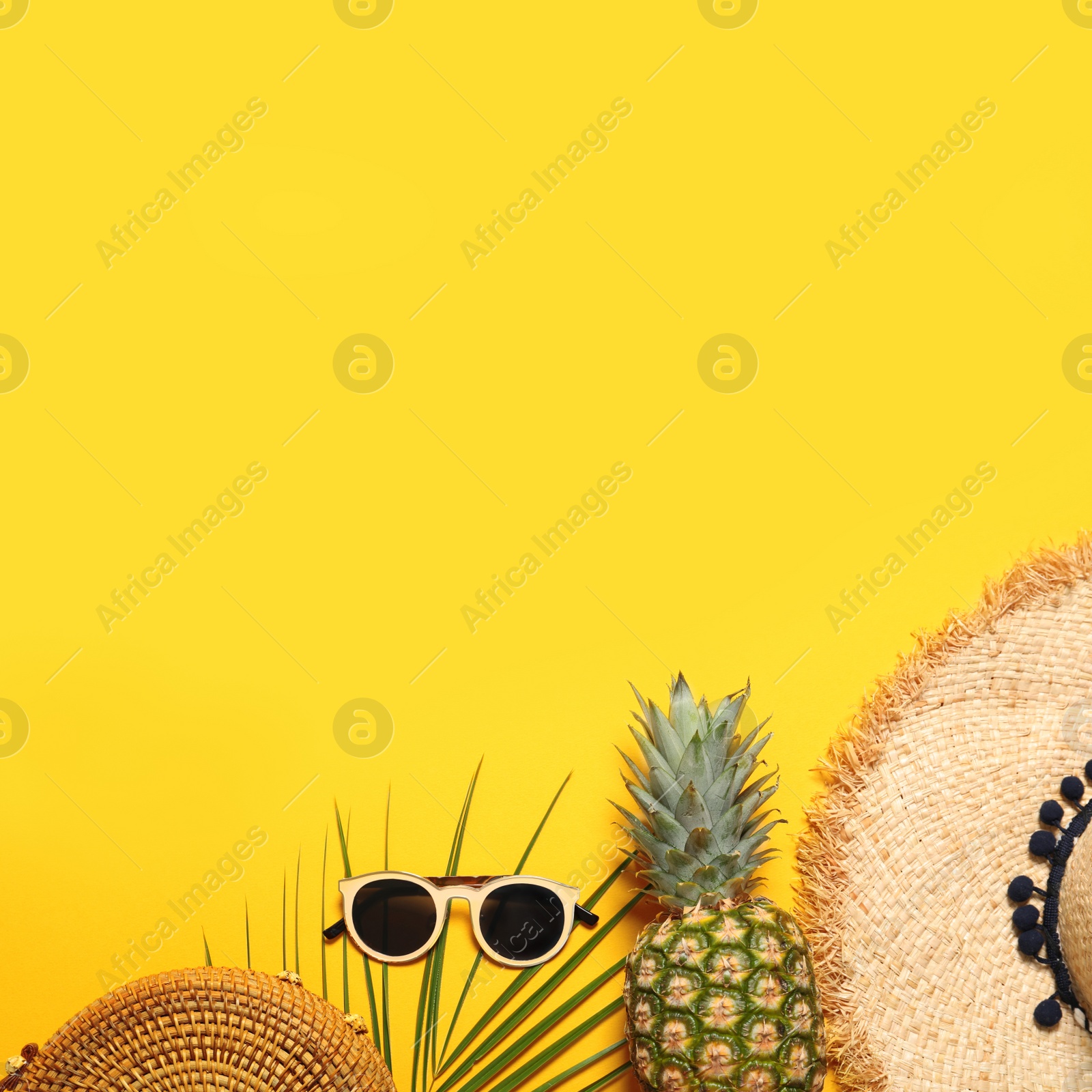 Photo of Flat lay composition with beach accessories on color background. Space for text