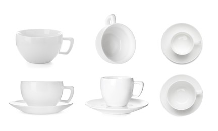 Image of Set with different ceramic coffee cups on white background