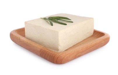 Photo of Wooden plate with delicious raw tofu and rosemary isolated on white