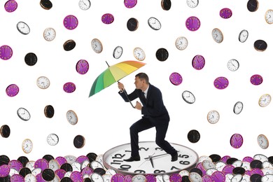 Deadline management. Businessman swimming on big clock among sea of small ones. Man protecting himself from falling clocks with umbrella