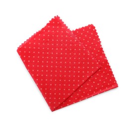 Photo of Red reusable beeswax food wrap on white background, top view