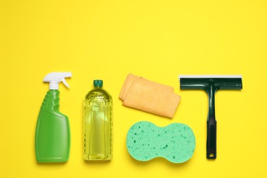 Photo of Different car products on yellow background, flat lay. Space for text