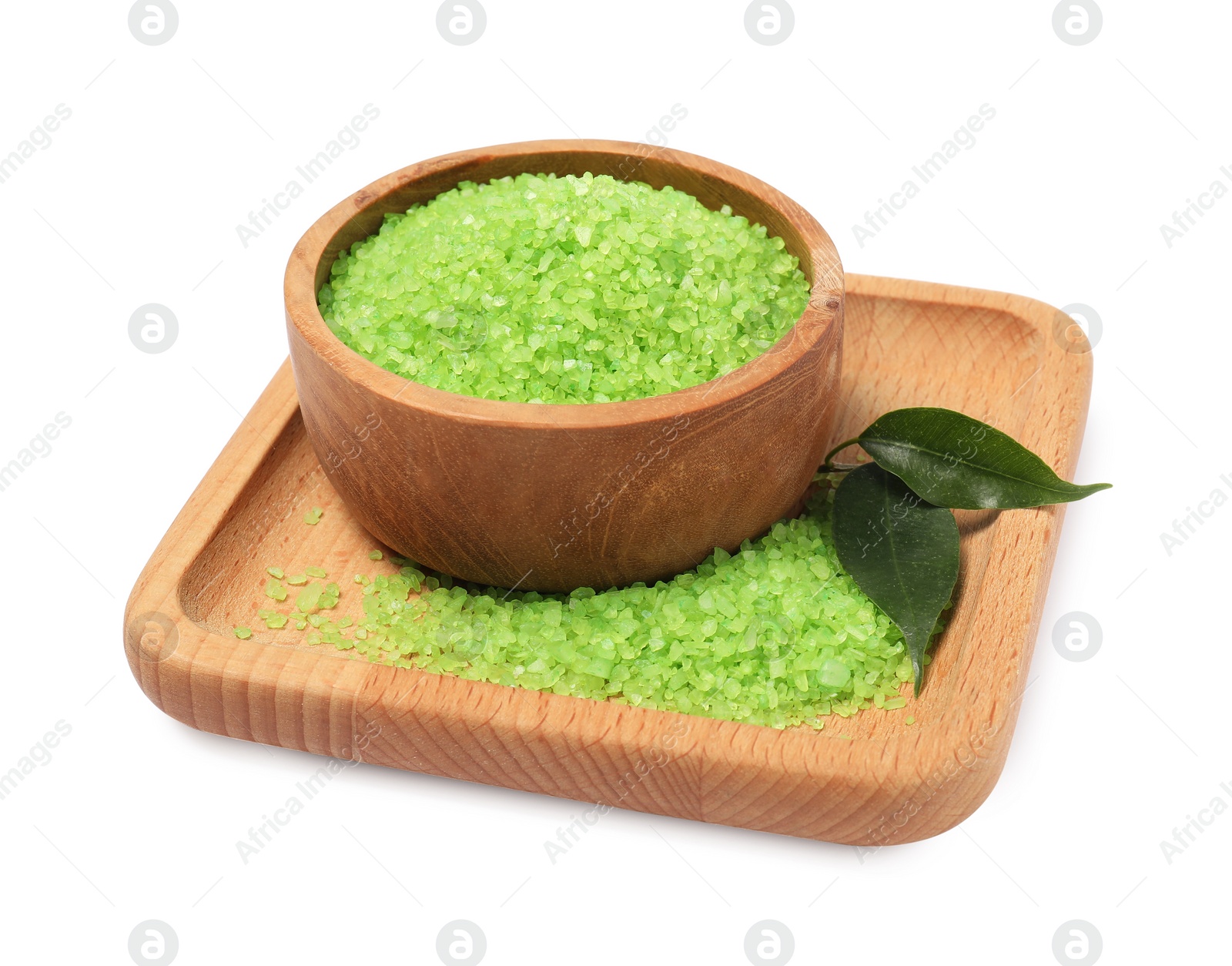 Photo of Green sea salt in bowl and leaves isolated on white