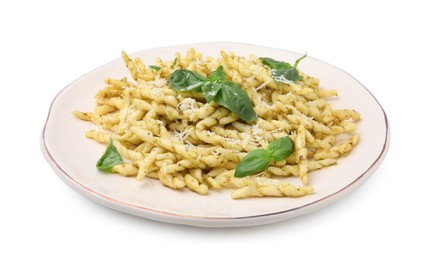Photo of Plate of delicious trofie pasta with pesto sauce, cheese and basil leaves isolated on white