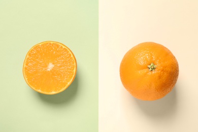 Flat lay composition with ripe oranges on color background