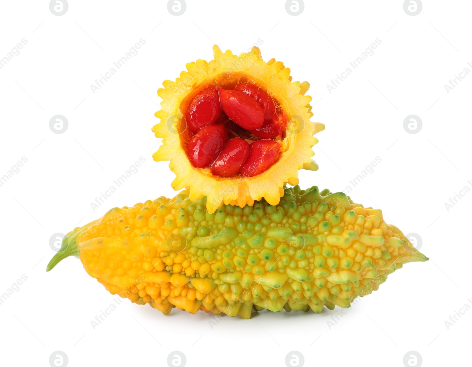 Photo of Fresh ripe bitter melons on white background