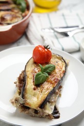 Photo of Plate of delicious eggplant lasagna on table