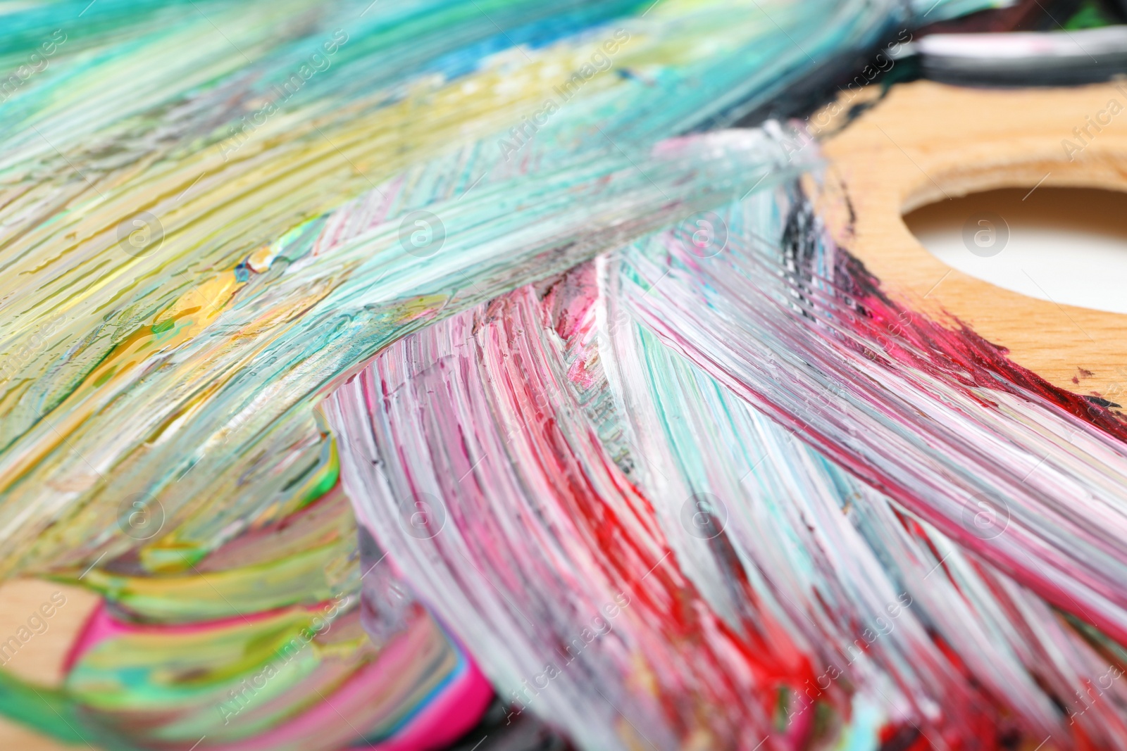 Photo of Abstract colorful acrylic paint as background, closeup view