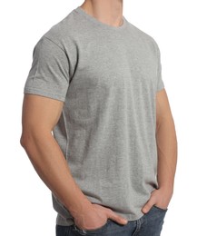 Photo of Man wearing grey t-shirt on white background, closeup. Mockup for design