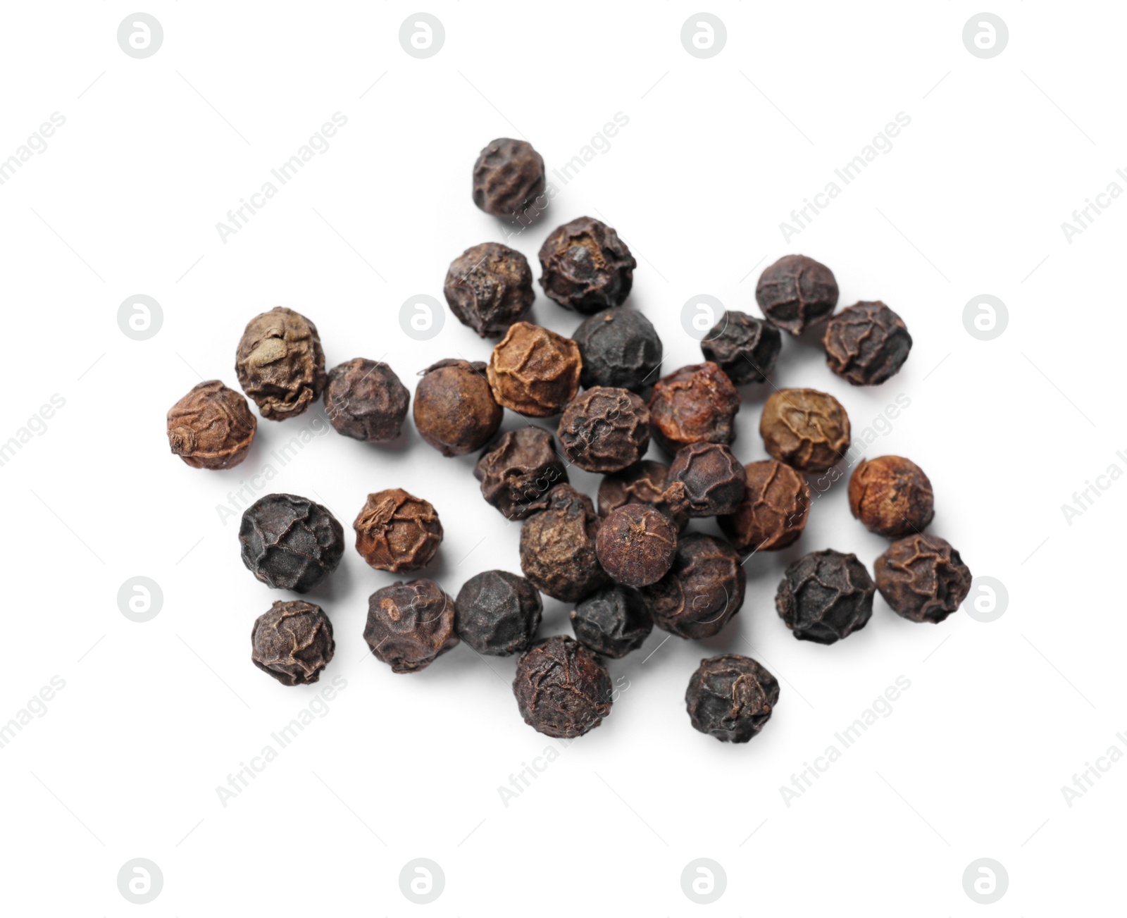 Photo of Aromatic spice. Many black dry peppercorns isolated on white, top view