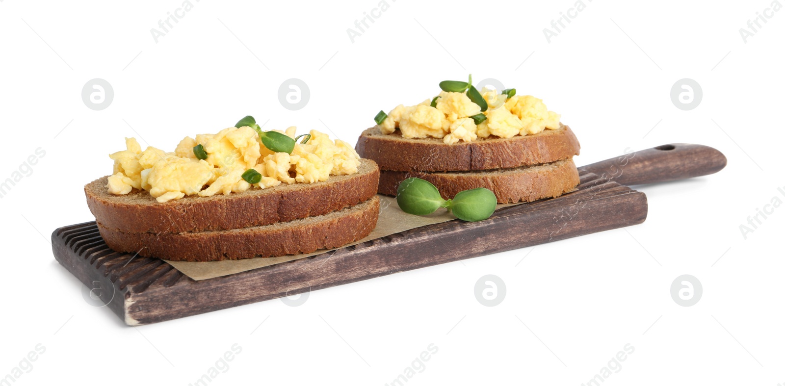 Photo of Tasty scrambled egg sandwiches isolated on white