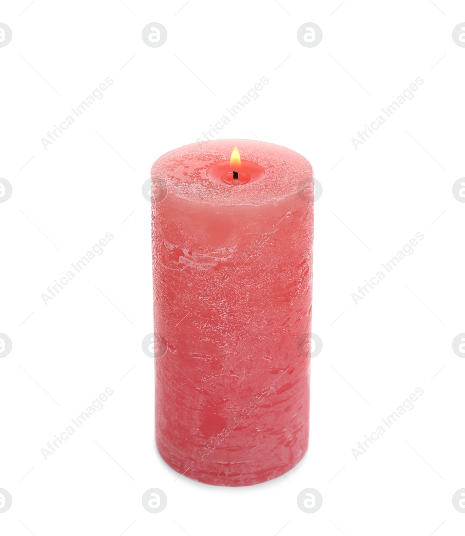 Photo of New pillar wax candle burning on white background