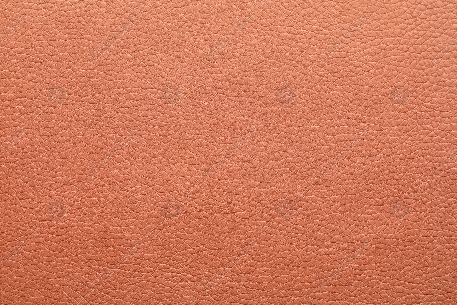Photo of Texture of dark pink leather as background, closeup