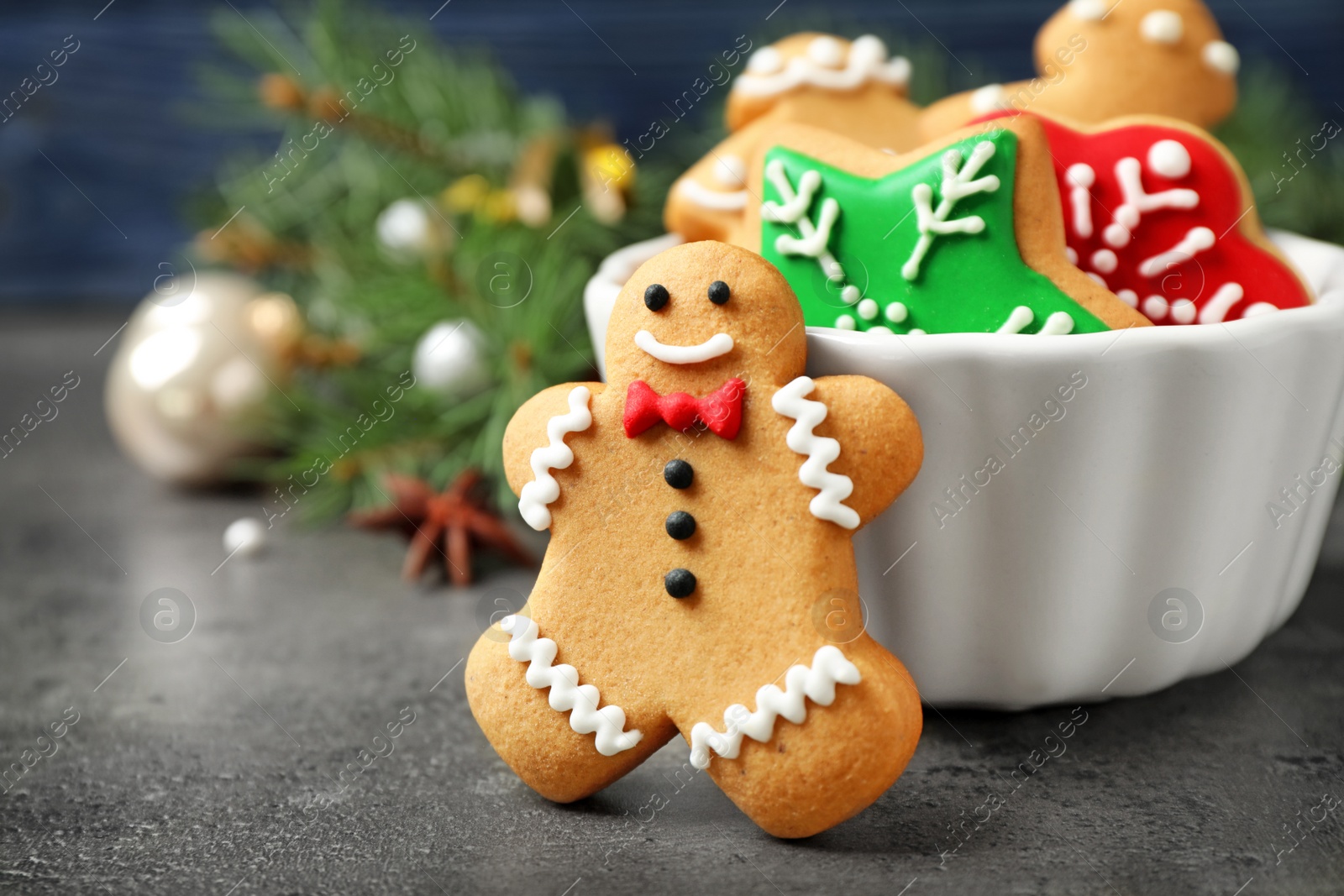 Photo of Tasty homemade Christmas cookies on grey table, closeup view