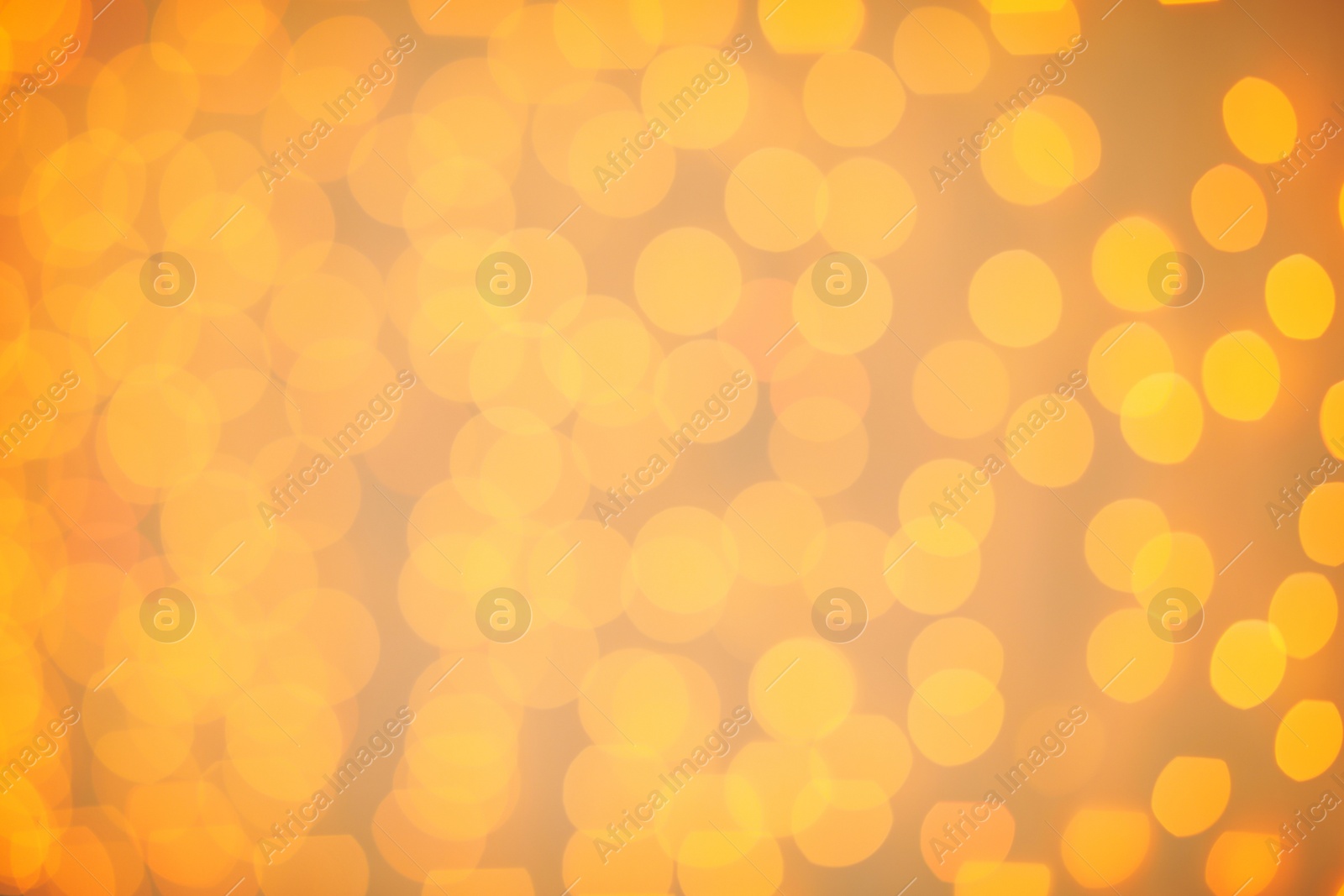 Photo of Beautiful gold lights as background. Bokeh effect