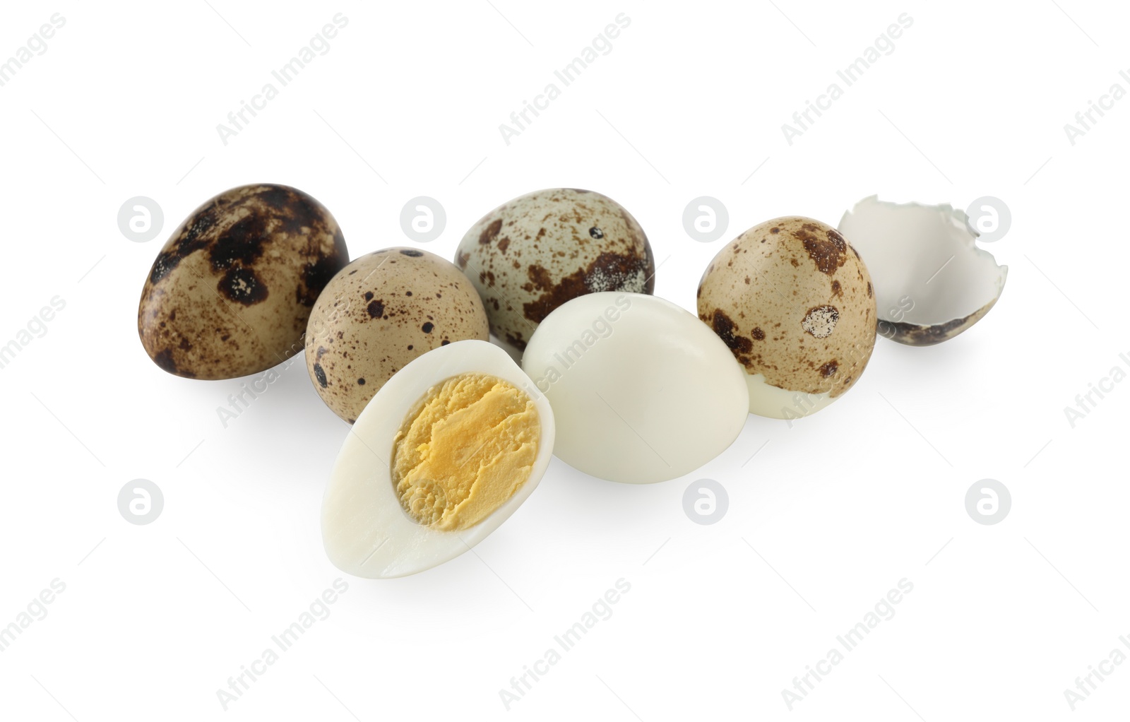 Photo of Unpeeled and peeled hard boiled quail eggs on white background