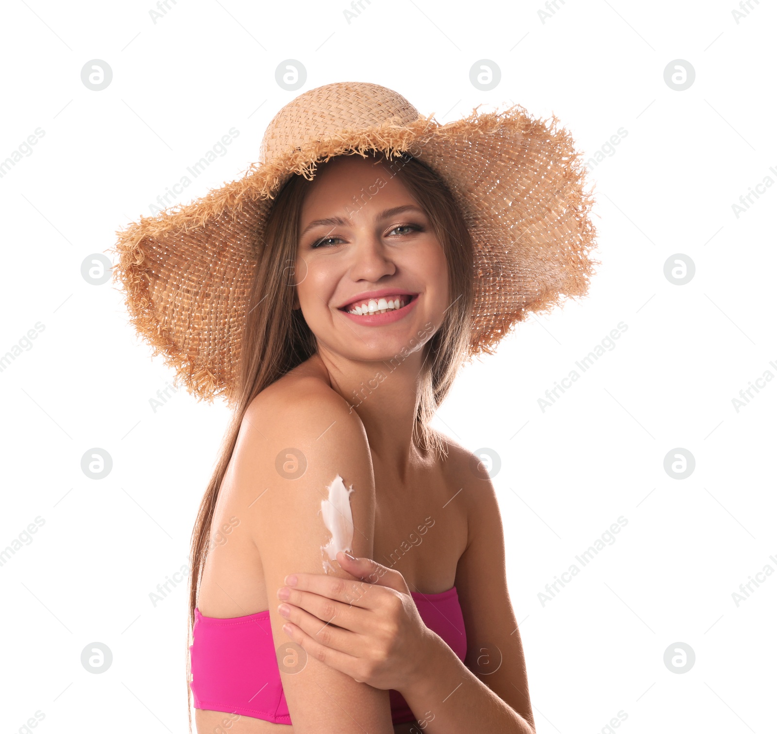 Photo of Woman applying sun protection cream on body against white background