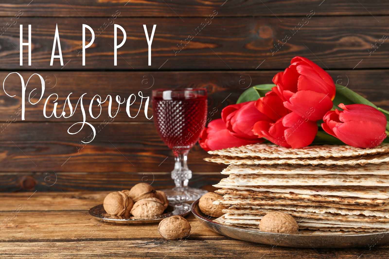 Image of Composition with Passover matzos on wooden table. Pesach celebration