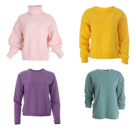 Image of Set of different stylish warm sweaters on white background