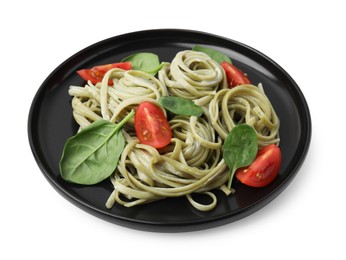 Tasty pasta with spinach, sauce and tomatoes isolated on white