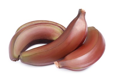 Tasty red baby bananas on white background