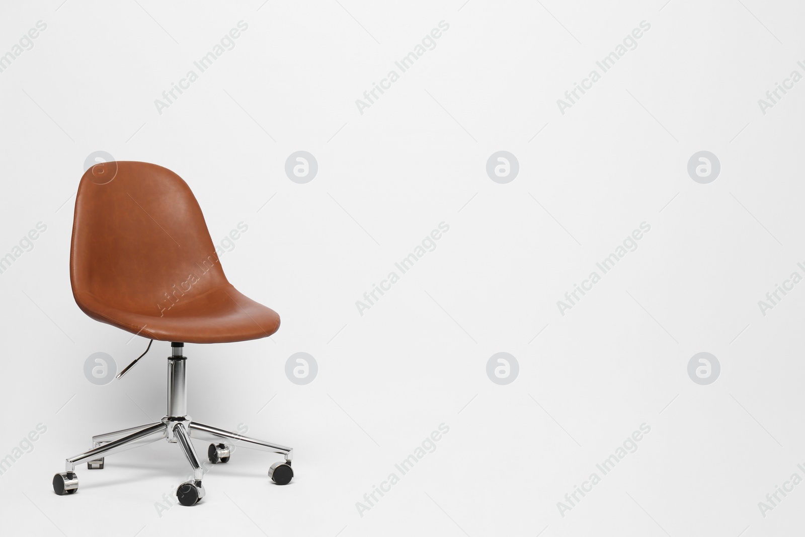 Photo of Comfortable office chair on white background, space for text