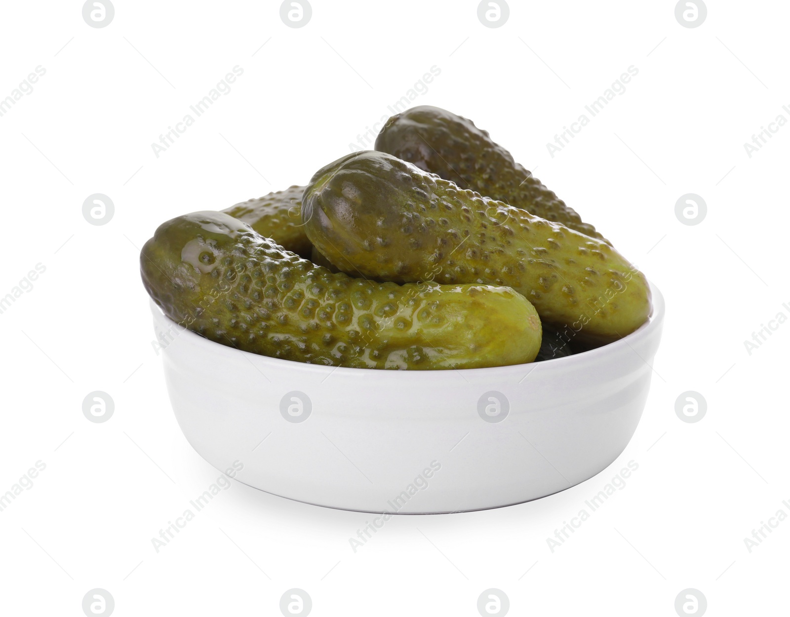 Photo of Bowl of tasty pickled cucumbers isolated on white