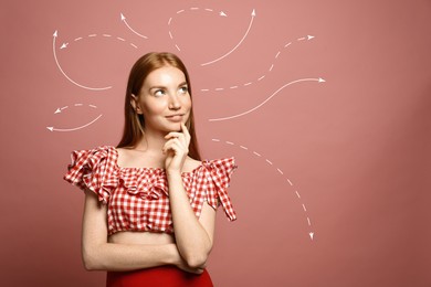 Image of Choice in profession or other areas of life, concept. Making decision, thoughtful young woman surrounded by drawn arrows on color background