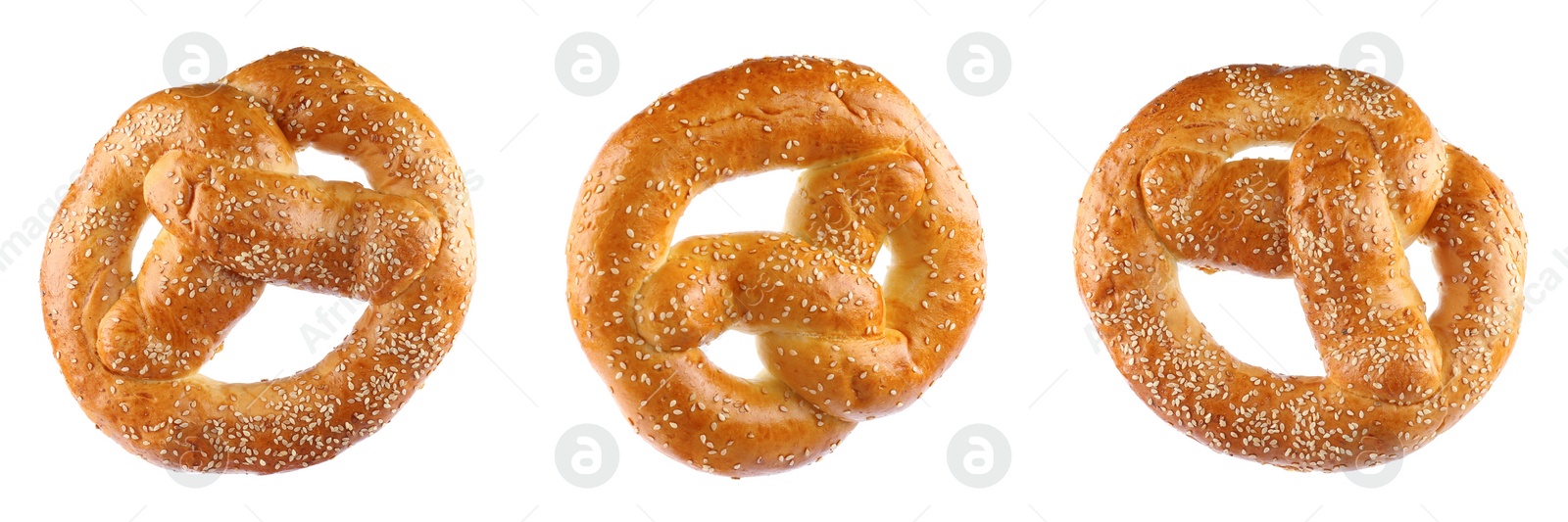 Image of Set with tasty freshly baked pretzels on white background. Banner design