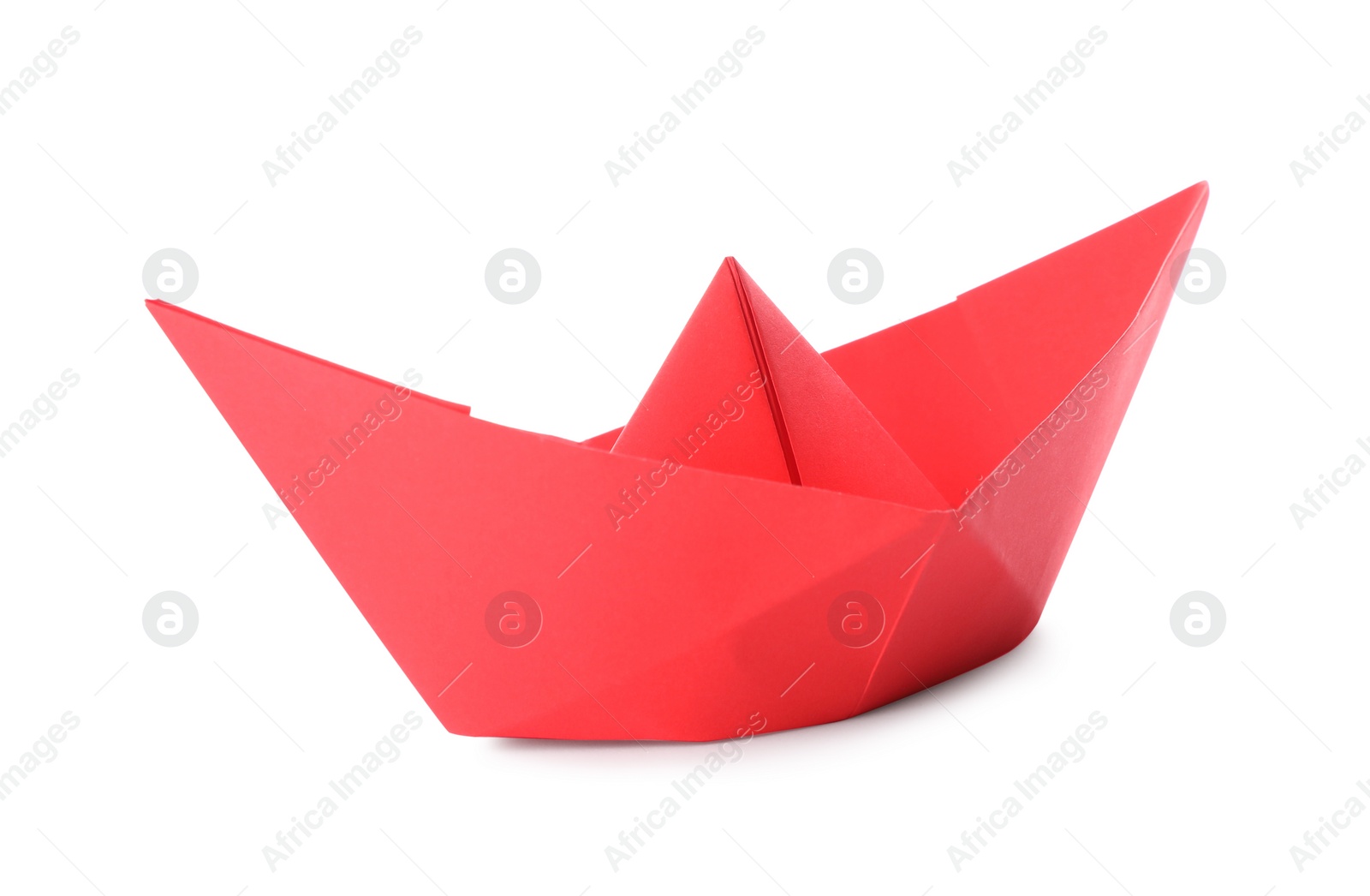 Photo of Handmade red paper boat isolated on white. Origami art