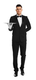 Photo of Elegant butler holding silver tray isolated on white