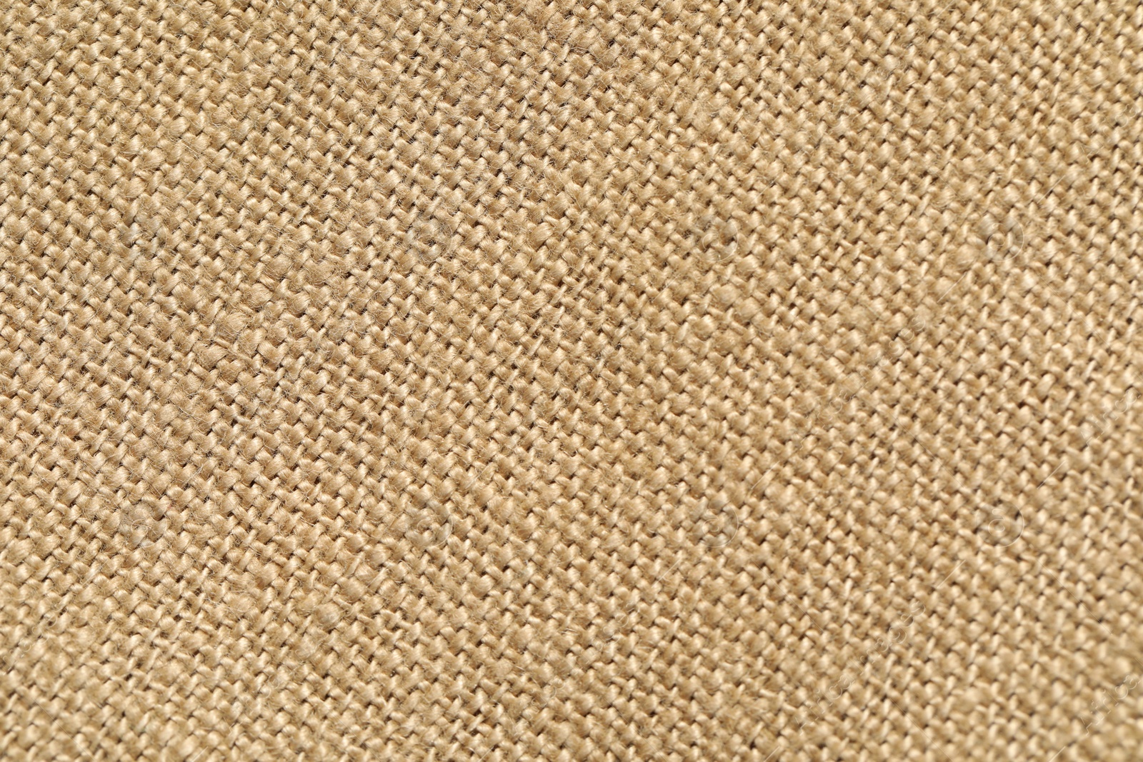 Photo of Texture of beige fabric as background, top view