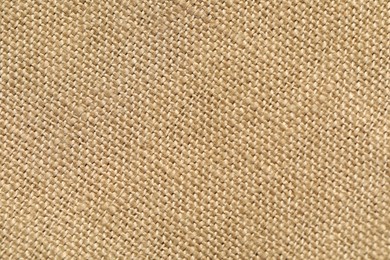 Texture of beige fabric as background, top view