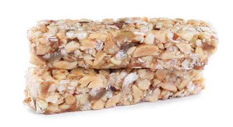 Photo of Sweet cereal bars isolated on white. Healthy snack