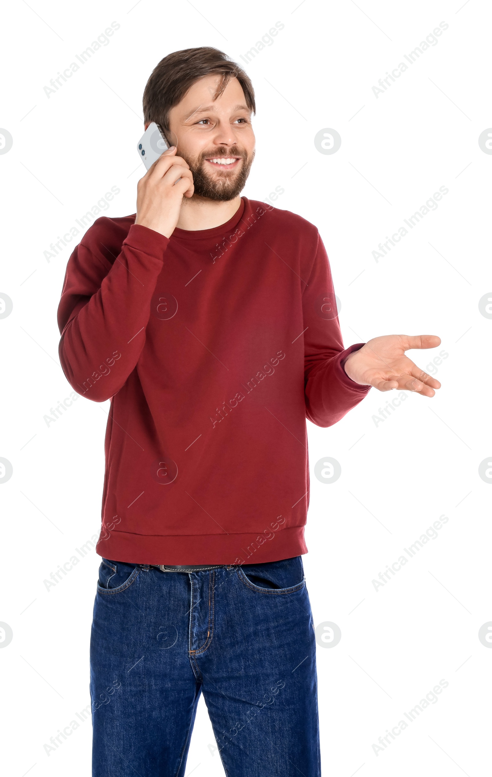 Photo of Man talking on smartphone against white background