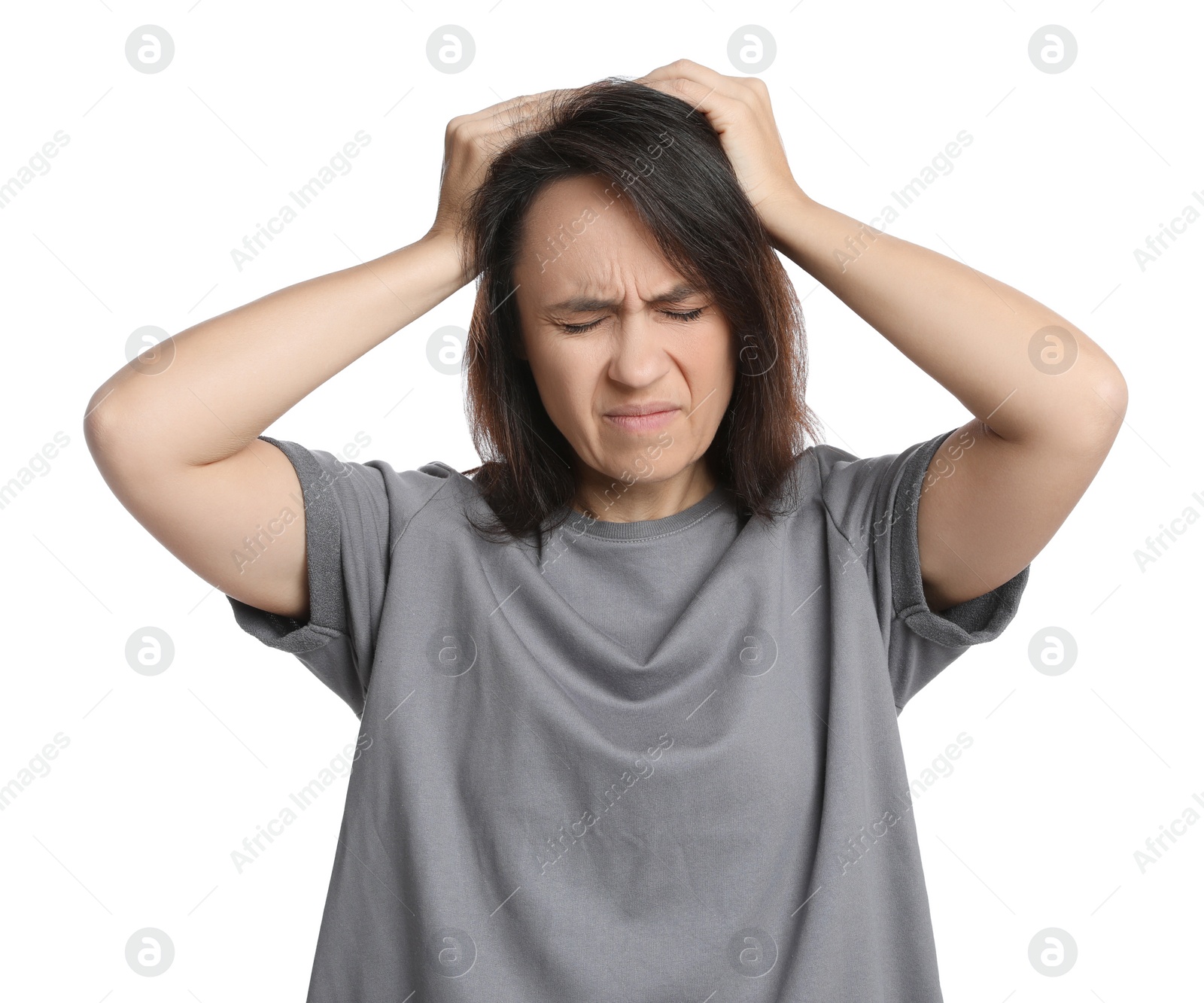 Photo of Mature woman suffering from headache on white background