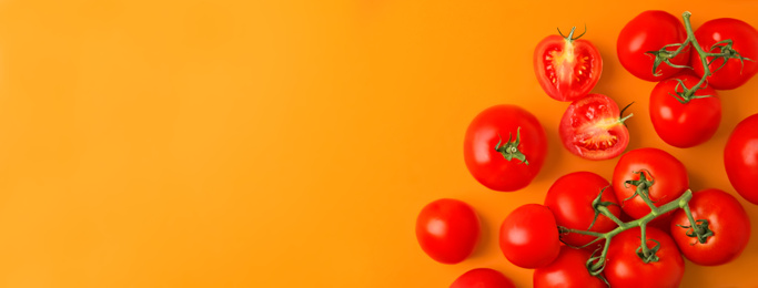 Image of Flat lay composition with fresh cherry tomatoes on color background, space for text. Banner design 